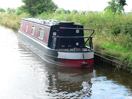 The 4 berth canal boat moored at the canalside